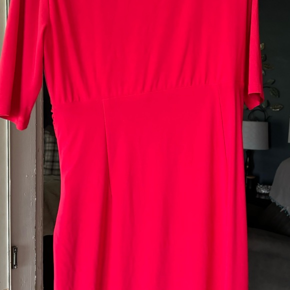 Light weight knit dress with short sleeves. Hem falls just below the knee. - Picture 2 of 4